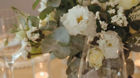 Decorated wedding table with with glasses of wine and meals Stock Footage 113543427