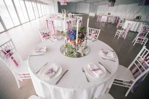 Decorated Wedding table setting with candles Stock Photos
