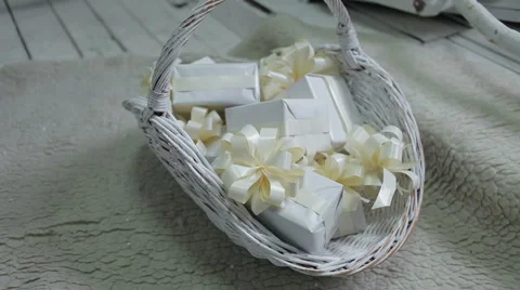 Decorated wicker white basket filled with christmas gifts, decor Stock Footage 45795155