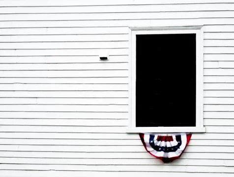 Decorated window on colonial building Stock Photos