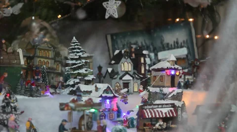 Decorated window with miniature models of Alpine village Видео 35909862