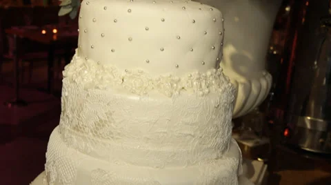 Decorating and icing a wedding cake Stock Footage 39952863