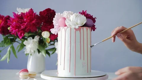 Decorating birthday or party cake with foil. Stock Footage 105448205