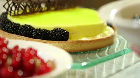 Decorating cake with fruit Stock Footage 32401536