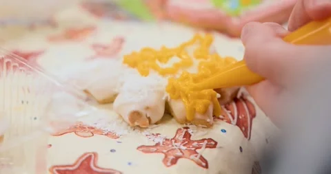 Decorating Cake with Icing and Sprinkles in Close-Up View Stock Footage 309470167