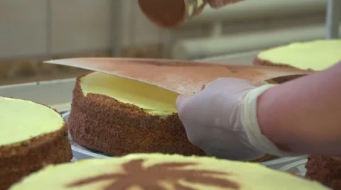 Decorating cake using grated chocolate over the stencil.mp4 Stock Footage 48941389