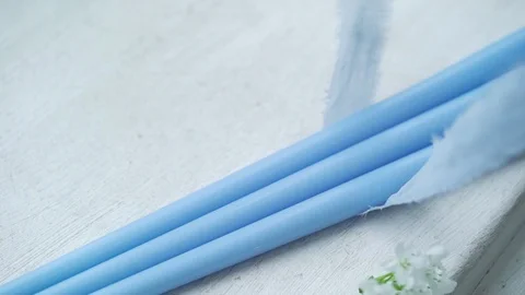 Decorating candles with ribbons Stock Footage 86331782