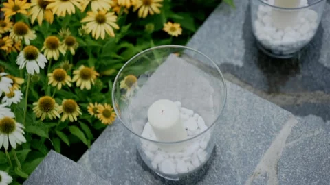 Decorating candles in the sunflowers Stock Footage 232002903