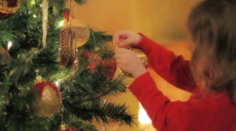 Decorating a Christmas tree 1 Stock Footage 29974438