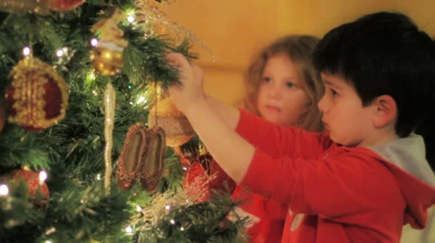 Decorating a Christmas tree 2 Stock Footage 30588247