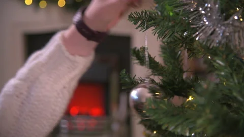 Decorating Christmas Tree Alone Close Up Stock Footage 144740868