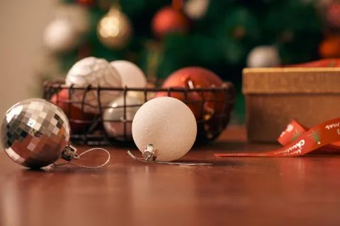 Decorating Christmas tree on bright background Foto stock
