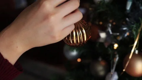 Decorating A Christmas Tree Stock-Footage 83022010