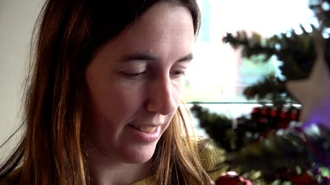 Decorating a Christmas Tree Stock Footage 99341306