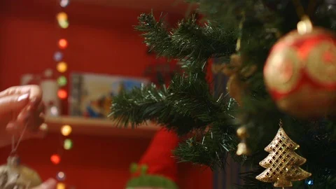 Decorating Christmas tree, hanging ball Stock Footage 69955366