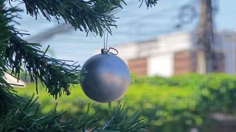 Decorating christmas tree with silver baubles. Christmas ornament. Stock Footage 305366410