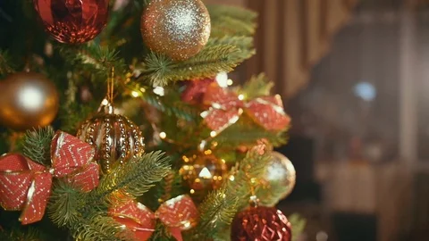 Decorating a Christmas Tree in Slow Motion Stock Footage 82541878