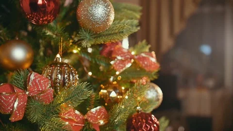 Decorating a Christmas Tree in Slow Motion Stock Footage 82542404