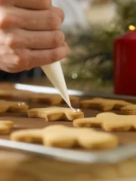 Decorating cookies Stock Photos