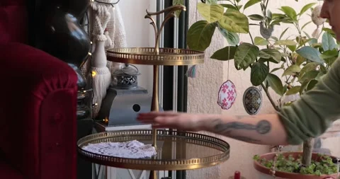 Decorating a Cozy Easter Tiered Tray with Easter Home Decor and Cozy Easter Stock Footage 306061074