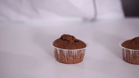 Decorating cup-cake with cream Stock-Footage 73020047