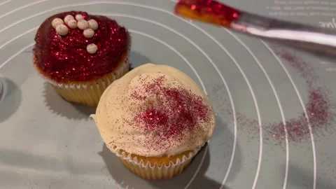 Decorating Cupcakes with Edible Glitter Stock Footage 345306808