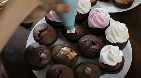 Decorating cupcakes Stock Footage 62449051