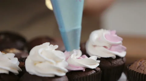 Decorating cupcakes Stock Footage 62450137