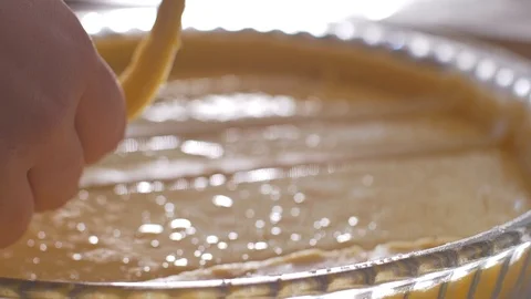 Decorating dessert with strips of dough Video stock 104432605