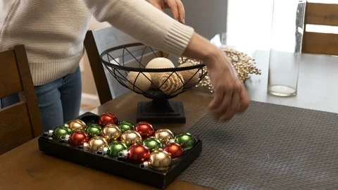 Decorating diner table for Christmas holiday Stock Footage 120638688