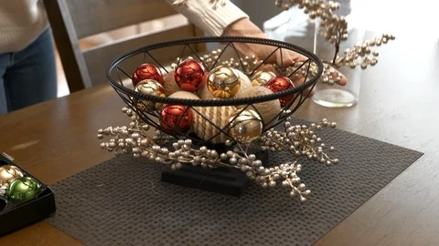 Decorating diner table for Christmas holiday Stock Footage 120638704