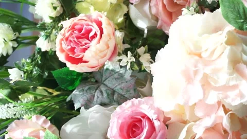 Decorating the festive hall with pink artificial flowers Stock Footage 238430412