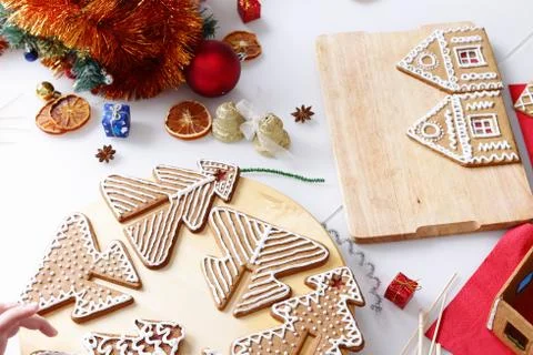 Decorating gingerbread cookies. Stock Photos