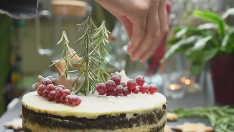 Decorating of gingerbread layer cake with pearl sugar. Stock Footage 171186274