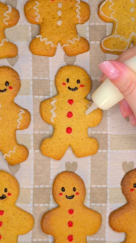 Decorating gingerbread man Stock Footage 294420902