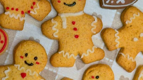 Decorating gingerbread men Stock Footage 294422218