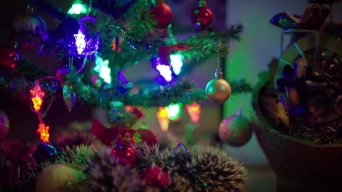 Decorating lights on a Christmas tree. Stock Footage 70354839