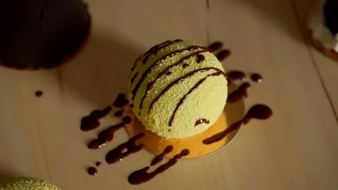 Decorating mini mousse pastry dessert covered with colorful velour. Modern cake. Stock Footage 135084526
