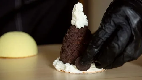 Decorating mini mousse pastry dessert covered with colorful velour. Modern cake. Stock-Footage 159674974