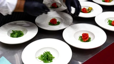 Decorating an original dish in slow motion Stock Footage 246438725
