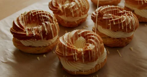 Decorating pastries at a bakery 4K. Stock Footage 221564979