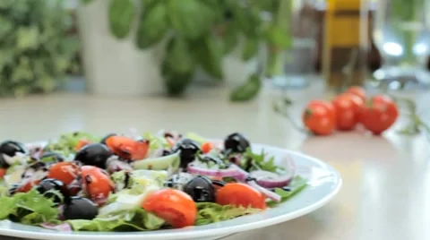 Decorating salad - slow motion, tracking shot Stock Footage 12719905