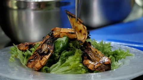 Decorating a Shrimp Dish Video stock 131367145