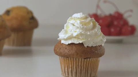 Decorating vanilla cupcake Stock Footage 70655169