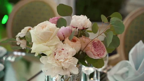 Decorating Wedding Table Decoration with Bouquets of Fresh Flowers Stock Footage 197742142