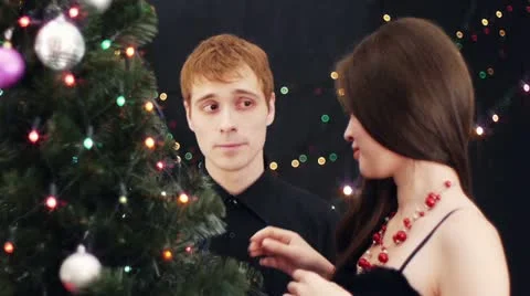 Decorating xmas tree Stock Footage 12550138