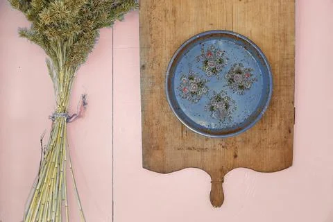 Decoration and kitchen objects - meat board - blue surface Stock Photos