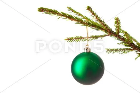 Decoration bauble on decorated Christmas tree iso Stock Photos