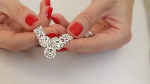 The decoration in the hands of the bride at a wedding Stock Footage 47309325