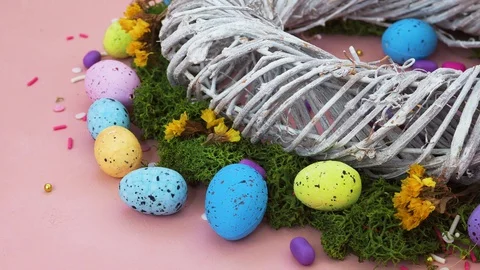 Decoration Happy Easter holiday wreath of twigs and colorful eggs Stock Footage
